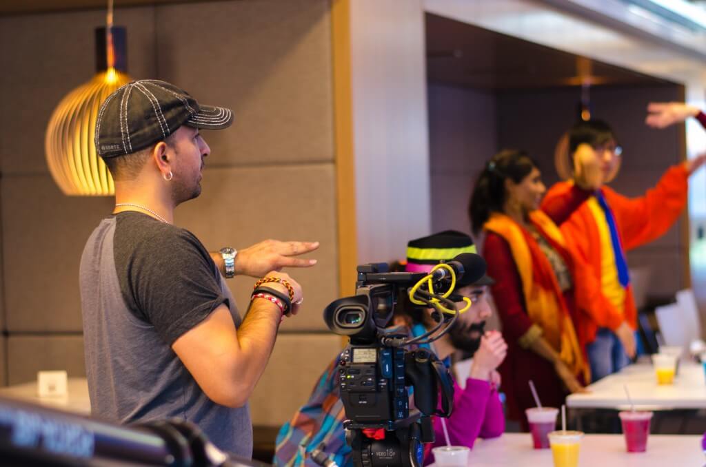 Chris directing the dancers before a shot